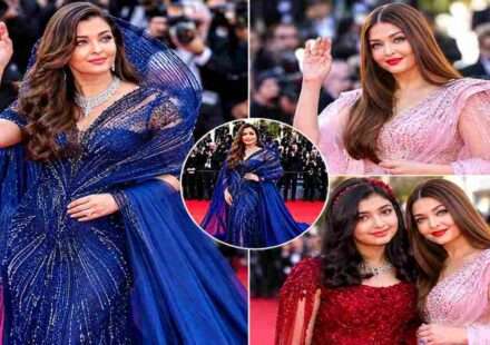 Aishwarya Rai Bachchan posing at Cannes 2026 red carpet in a sparkling blue designer gown with elegant diamond jewellery.